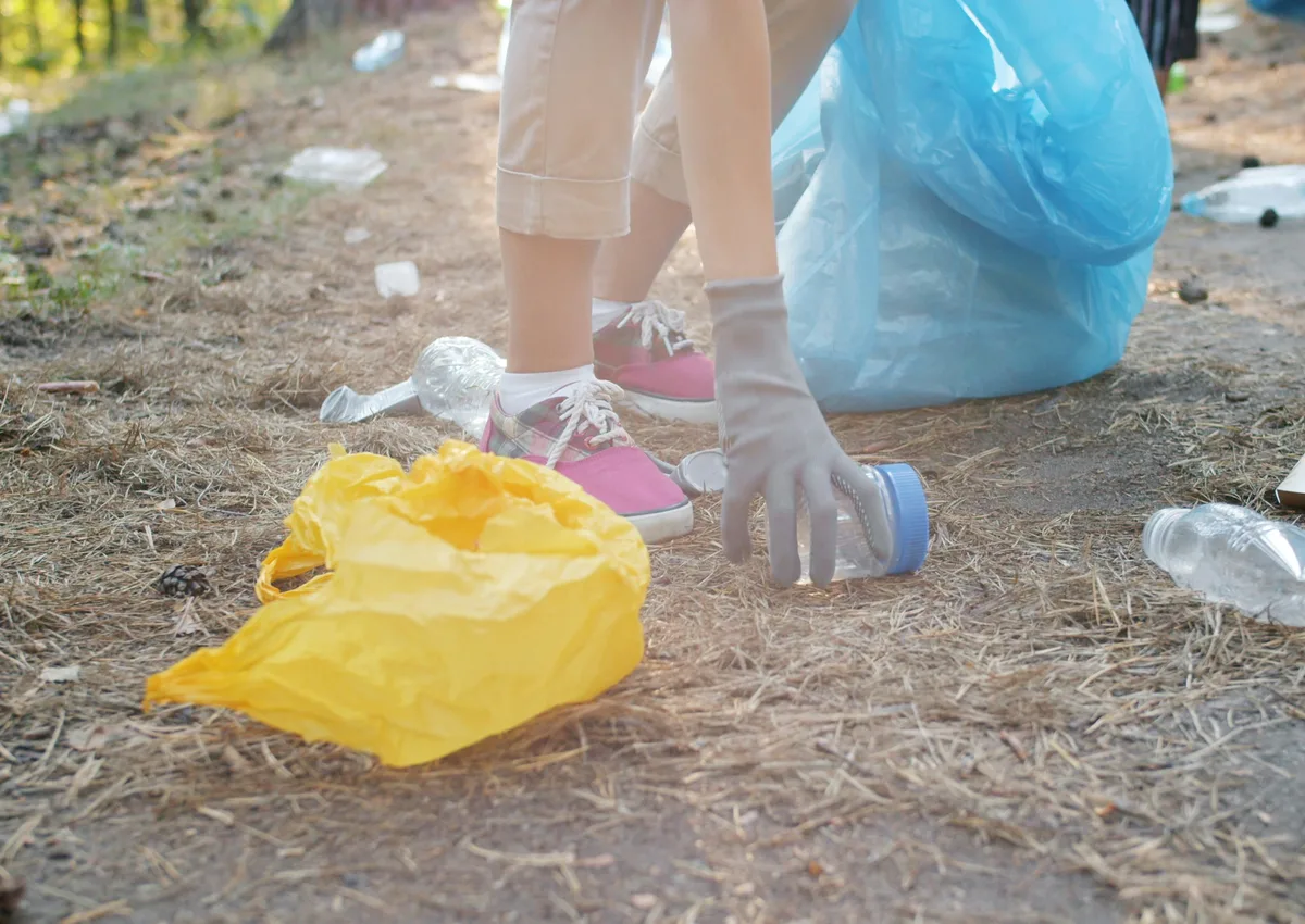 Exterior litter and debris being collected from a property